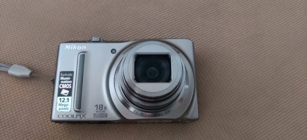 Nikon Coolpix S9100 model gümüş renkli fotoğraf makinesi. - 8