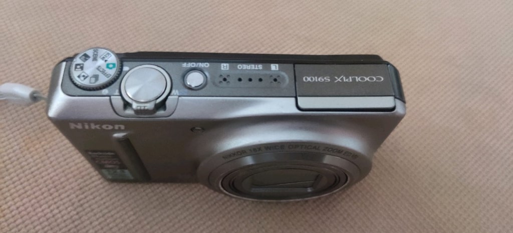 Nikon Coolpix S9100 model gümüş renkli fotoğraf makinesi. - 18