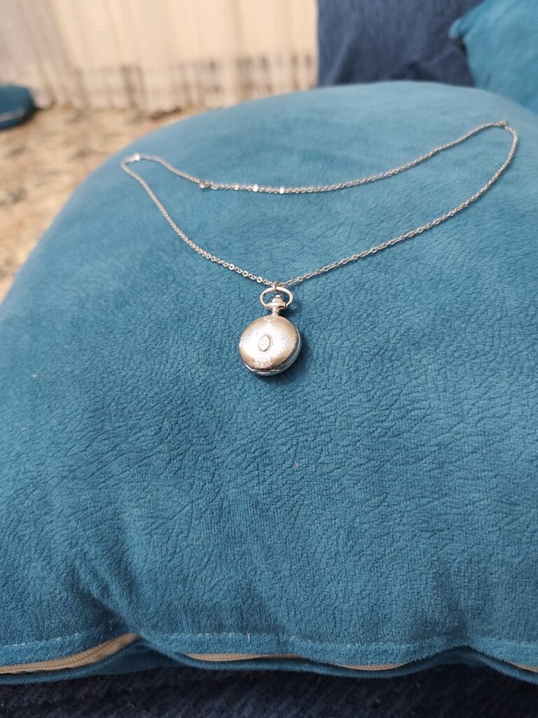 zen pırlanta saat kolye