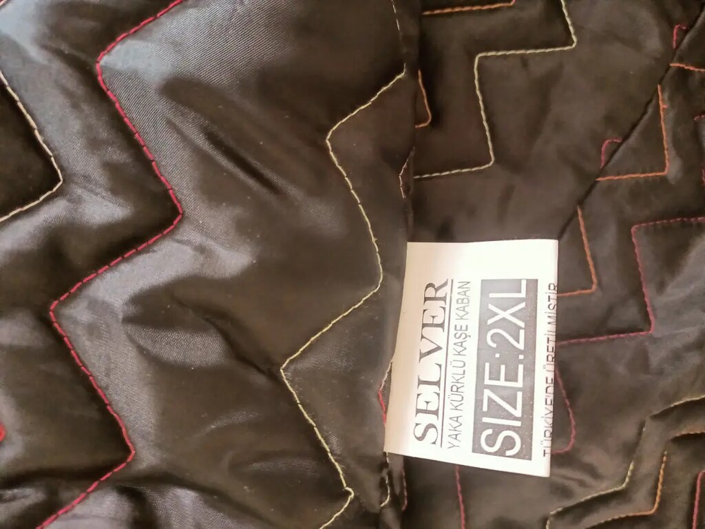 Sıfır hiç kullanılmadı beden ölçüsü üstünde yazıyor