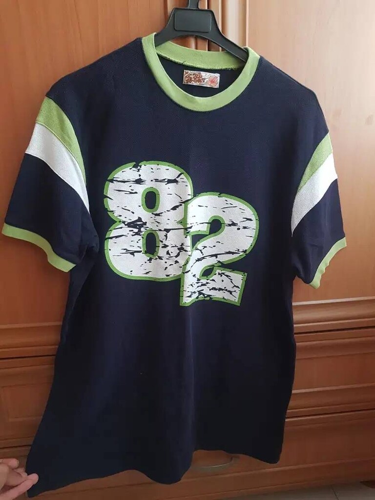 De Facto tshirt