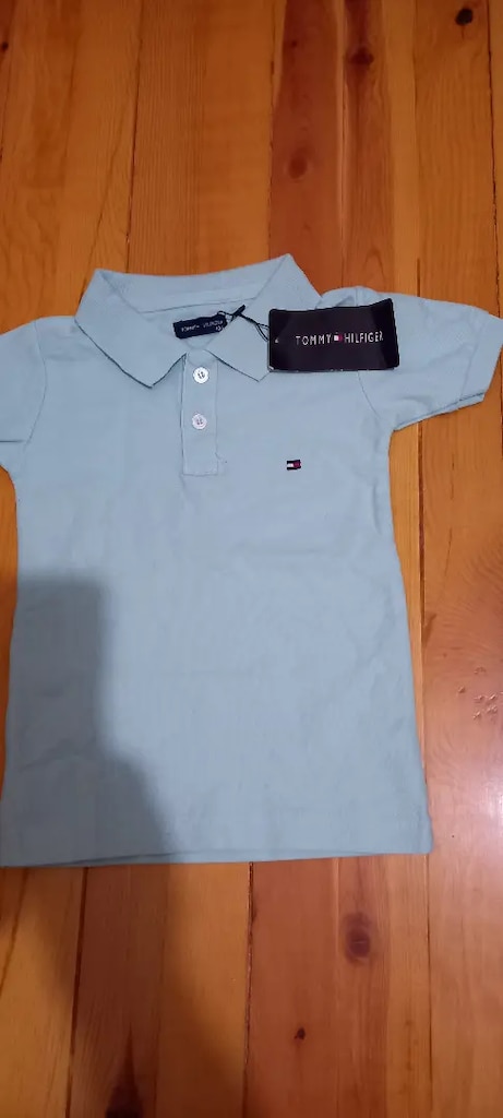 104 cm lacoste tişört.yeni .ürün etiketi üstünde
