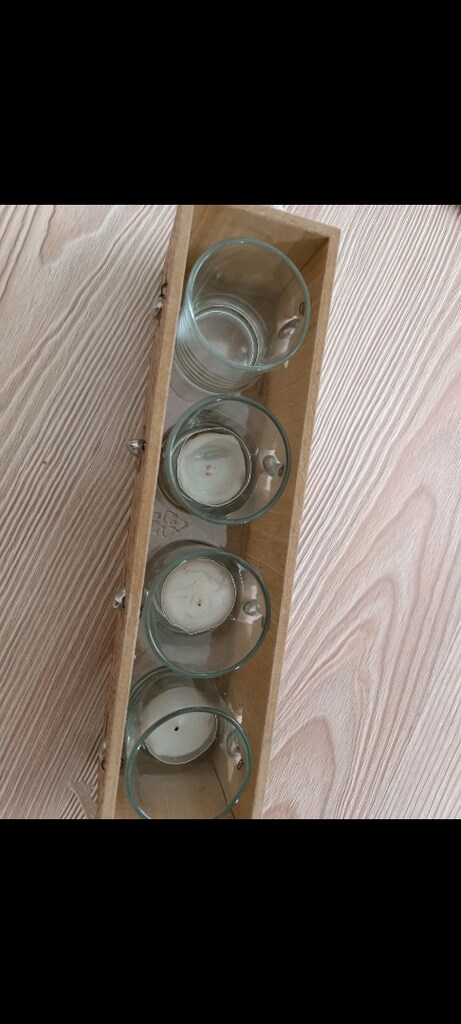 Tchibo markasına ait yıldız desenli bu dekoratif ahşap tealight mumluk - 8