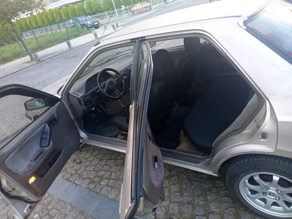 mazda 323 1.6 - 7