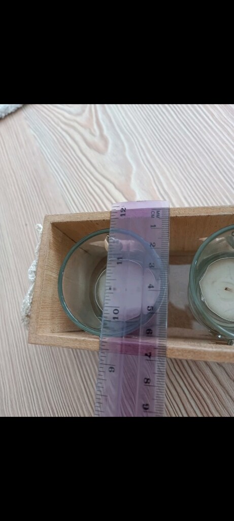 Tchibo markasına ait yıldız desenli bu dekoratif ahşap tealight mumluk - 10