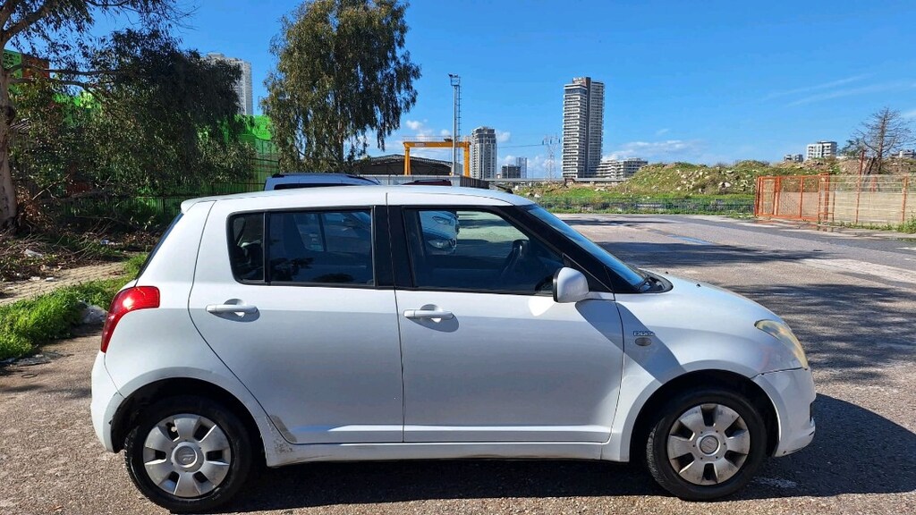 Suzuki Swift 1.3 ddis - 11