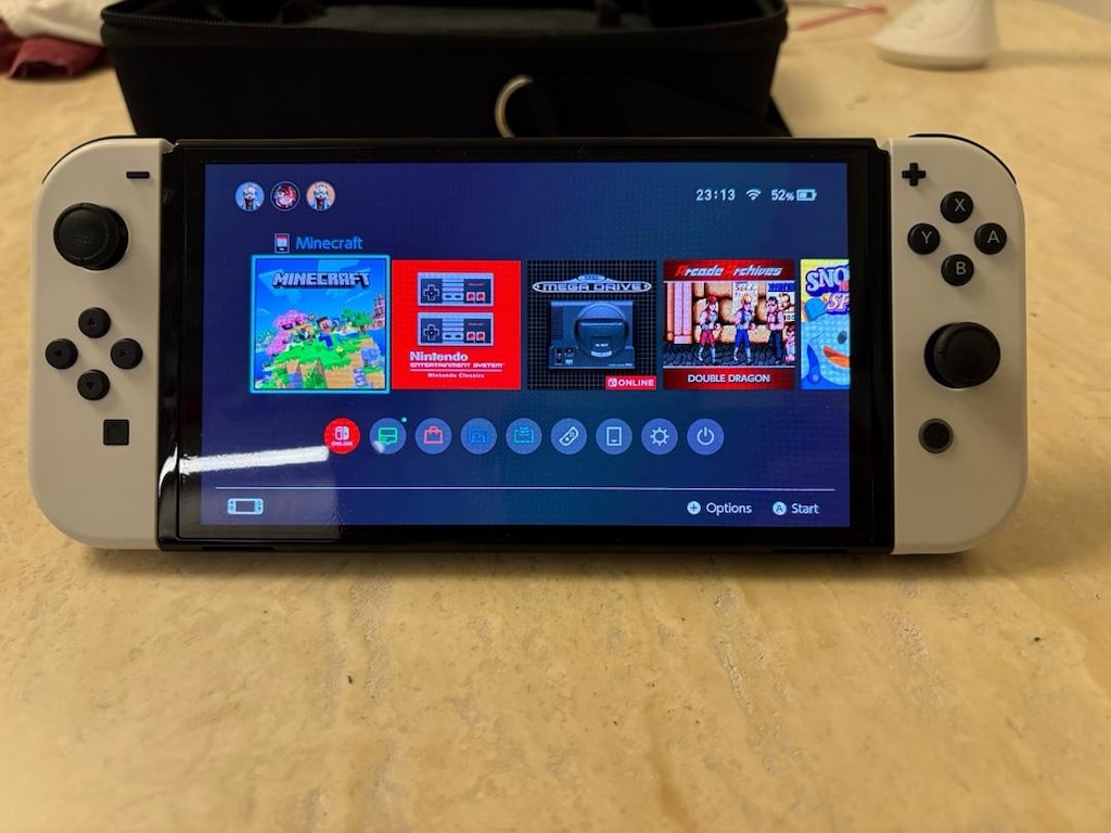 Nintendo switch oled + iki oyun ve aksesuarlar - 3