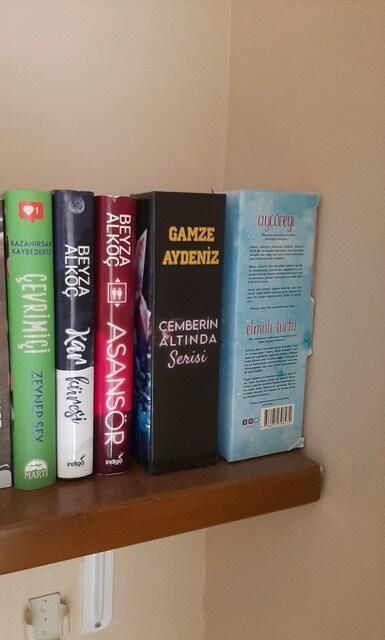 7 tane kitap ciltli