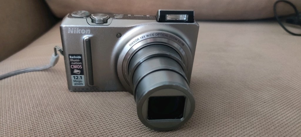 Nikon Coolpix S9100 model gümüş renkli fotoğraf makinesi. - 14