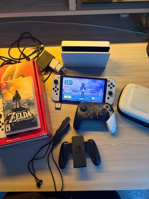 Nintendo switch Oled + 2 oyun pro controller ve dahası