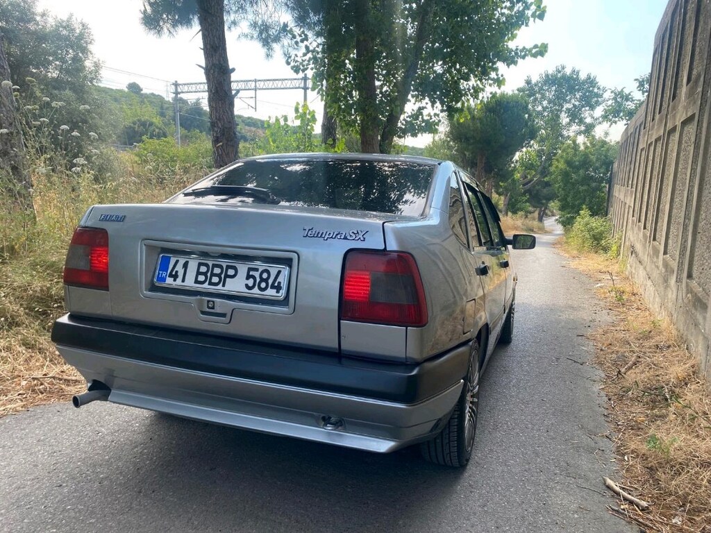 93 MODEL TEMPRA. SX - 12