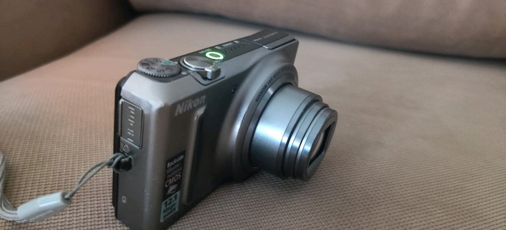 Nikon Coolpix S9100 model gümüş renkli fotoğraf makinesi. - 7