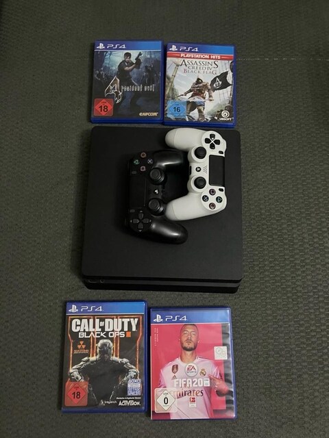 Temiz Playstation 4 Slim 1TB - 2 adet dualshock- 4 adet oyun
