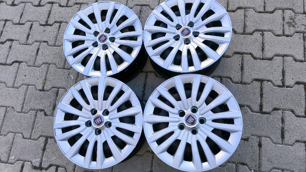 Egea orjinal 15 inc 5*98 bicon teneke jant ve orjinal kapaklari.