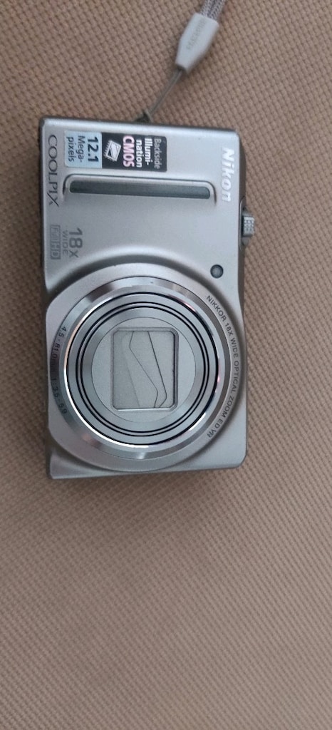 Nikon Coolpix S9100 model gümüş renkli fotoğraf makinesi. - 17