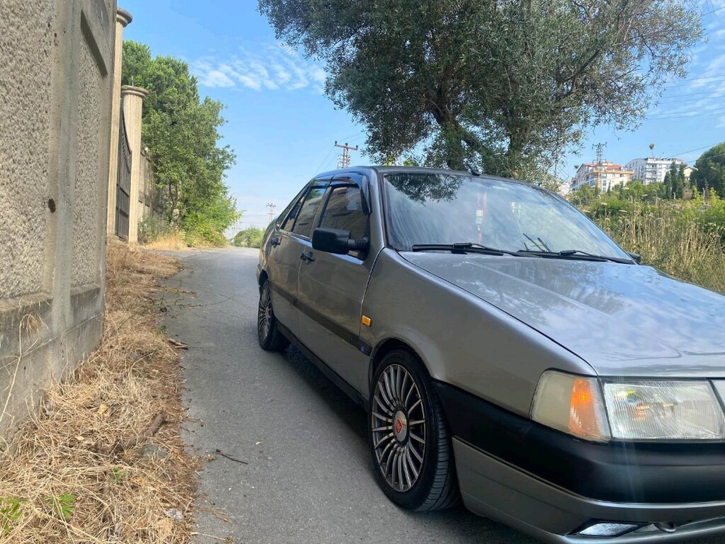 93 MODEL TEMPRA. SX - 8