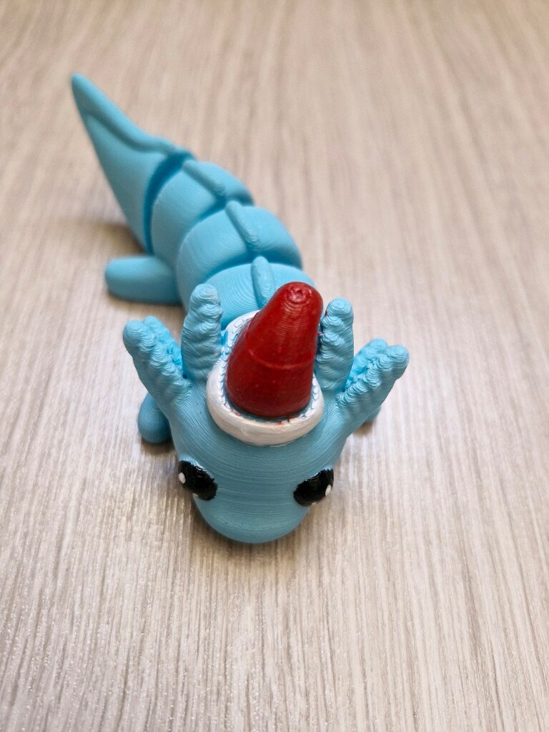 noel şapkalı mini dino