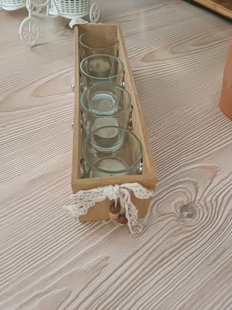 Tchibo markasına ait yıldız desenli bu dekoratif ahşap tealight mumluk - 2