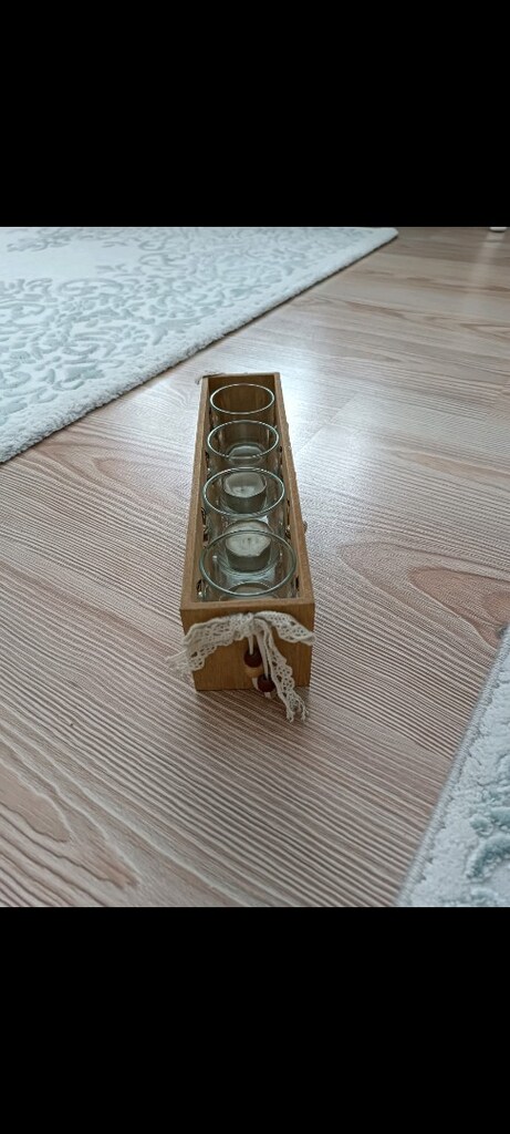 Tchibo markasına ait yıldız desenli bu dekoratif ahşap tealight mumluk - 12