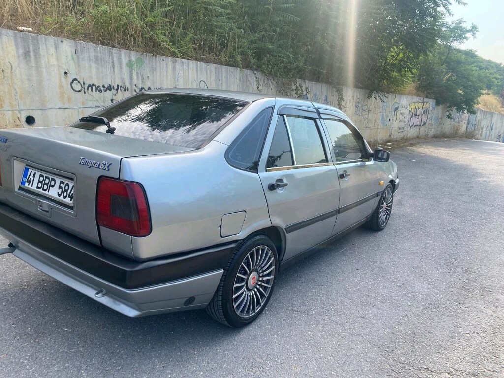 93 MODEL TEMPRA. SX - 6