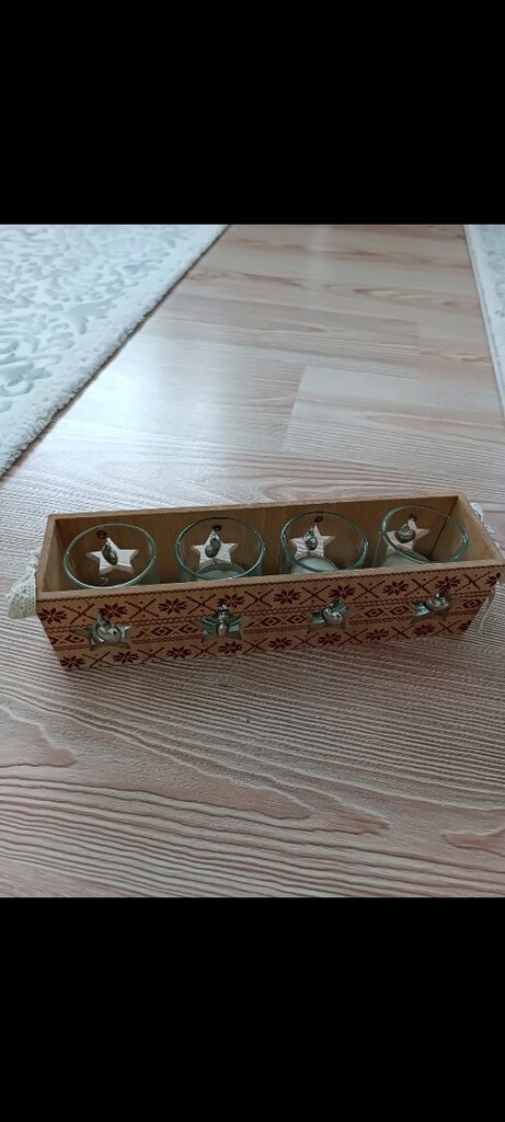 Tchibo markasına ait yıldız desenli bu dekoratif ahşap tealight mumluk - 14