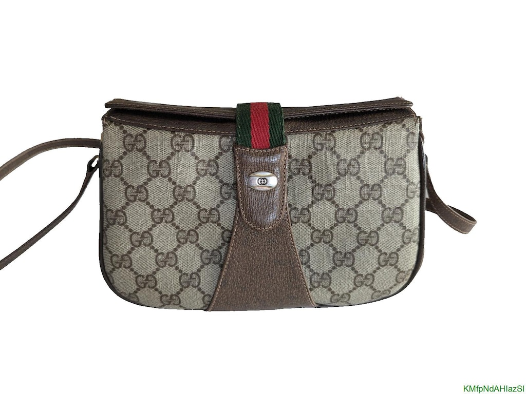 Gucci aksesuar koleksiyonu vintage deri kol çantası. Yeni gibi!